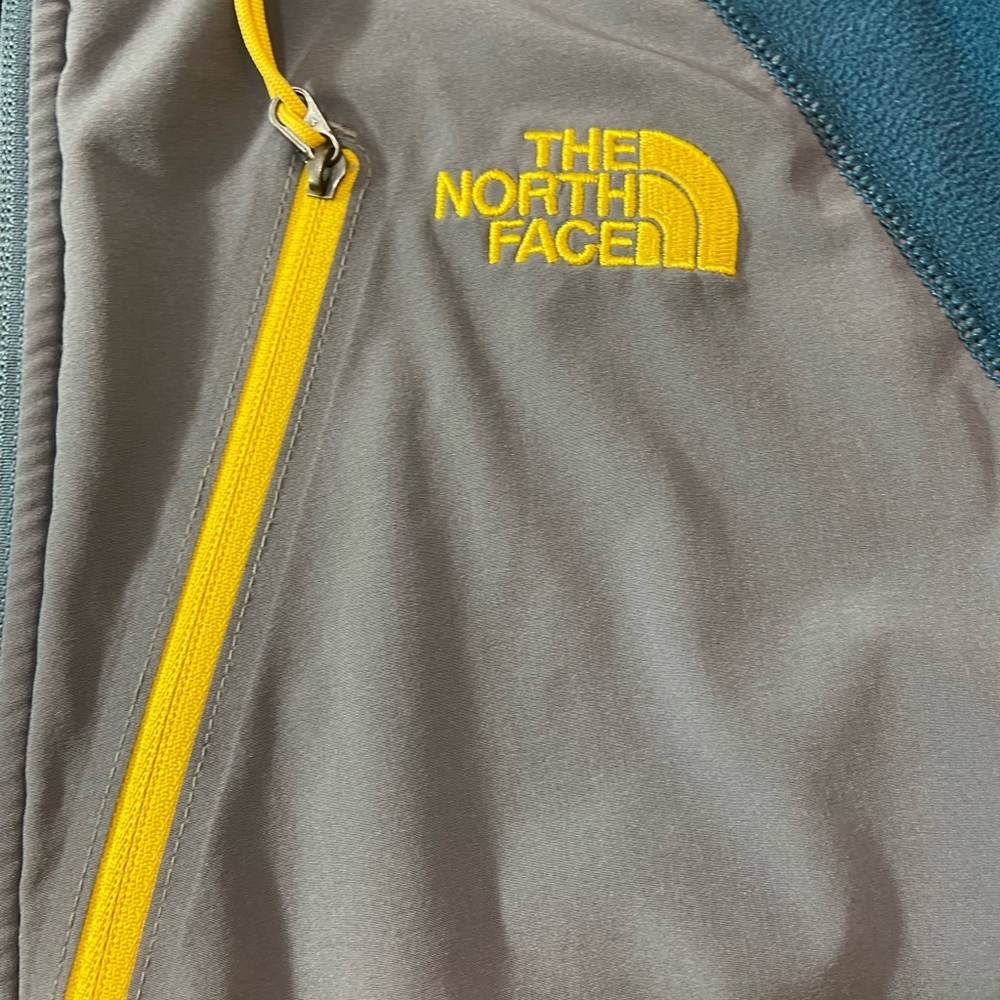 The North Face Gray and Teal Jacket with Yellow Accents